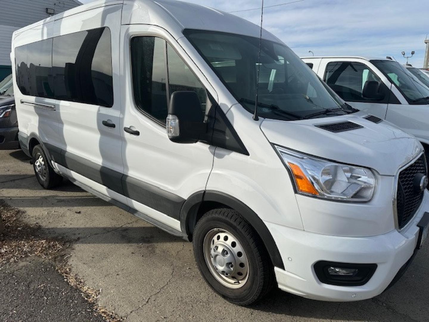 2022 White /Gray Ford Transit 350 Wagon Med. Roof XLT w/Sliding Pass. 148-in. WB (1FBAX9C85NK) with an 3.5L V6 DOHC 24V engine, 6A transmission, located at 3200 1st Avenue North, Billings, MT, 59101, (406) 245-9055, 45.779270, -108.510742 - This is One of Our Super Vehicles Available for Rent. 12 Passenger Seating, Power Heated Seats, Tilt Steering, Cruise Control, Air Conditioning, Towing, All Wheel Drive, Larger Fuel Tank, and Many More Custom Options! CarFax Dealer Auto Brokers of Montana/AA&A Auto Rental/Fox Car Rental Billings - Photo#1